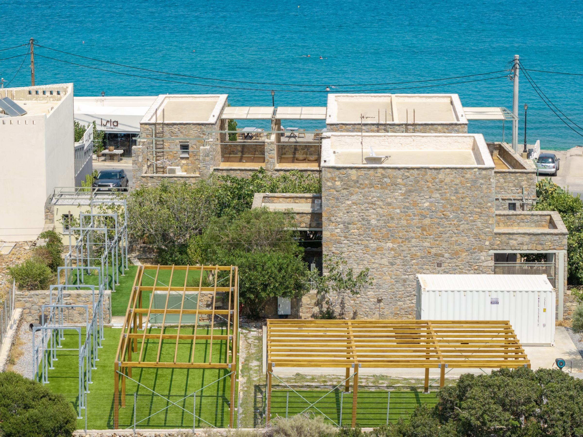 Fig Tree Villa from above, the open-air gym and the sea